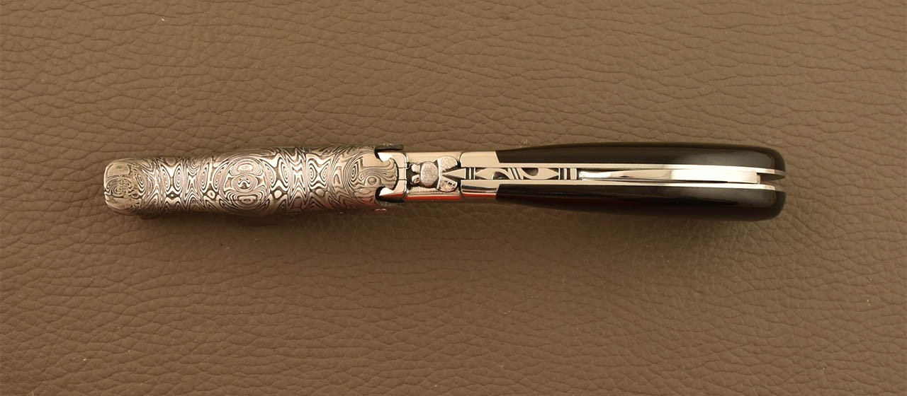 Damascus Laguiole corkscrew handmade in France buffalo horn tip